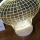 Illustration for article titled Trade In Your Boring Desk Lamp For This Glowing Optical Illusion Light